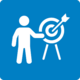 Das Symbol zeigt eine Person, die auf eine Zielscheibe mit einem Pfeil in der Mitte zeigt. Der Hintergrund ist blau, die Figuren sind weiß. Es steht für Zielstrebigkeit, Fokus und das Erreichen von gesetzten Zielen – etwa in Projekten, Weiterbildung oder Unternehmensstrategien.
